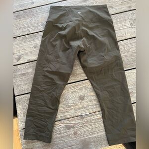 Lululemon army green leggings, size 10, 21” inseam.